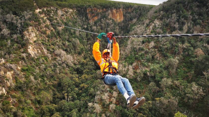 Guy going across Knysna Ziplines