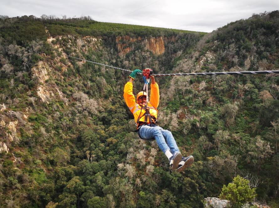 Guy going across Knysna Ziplines